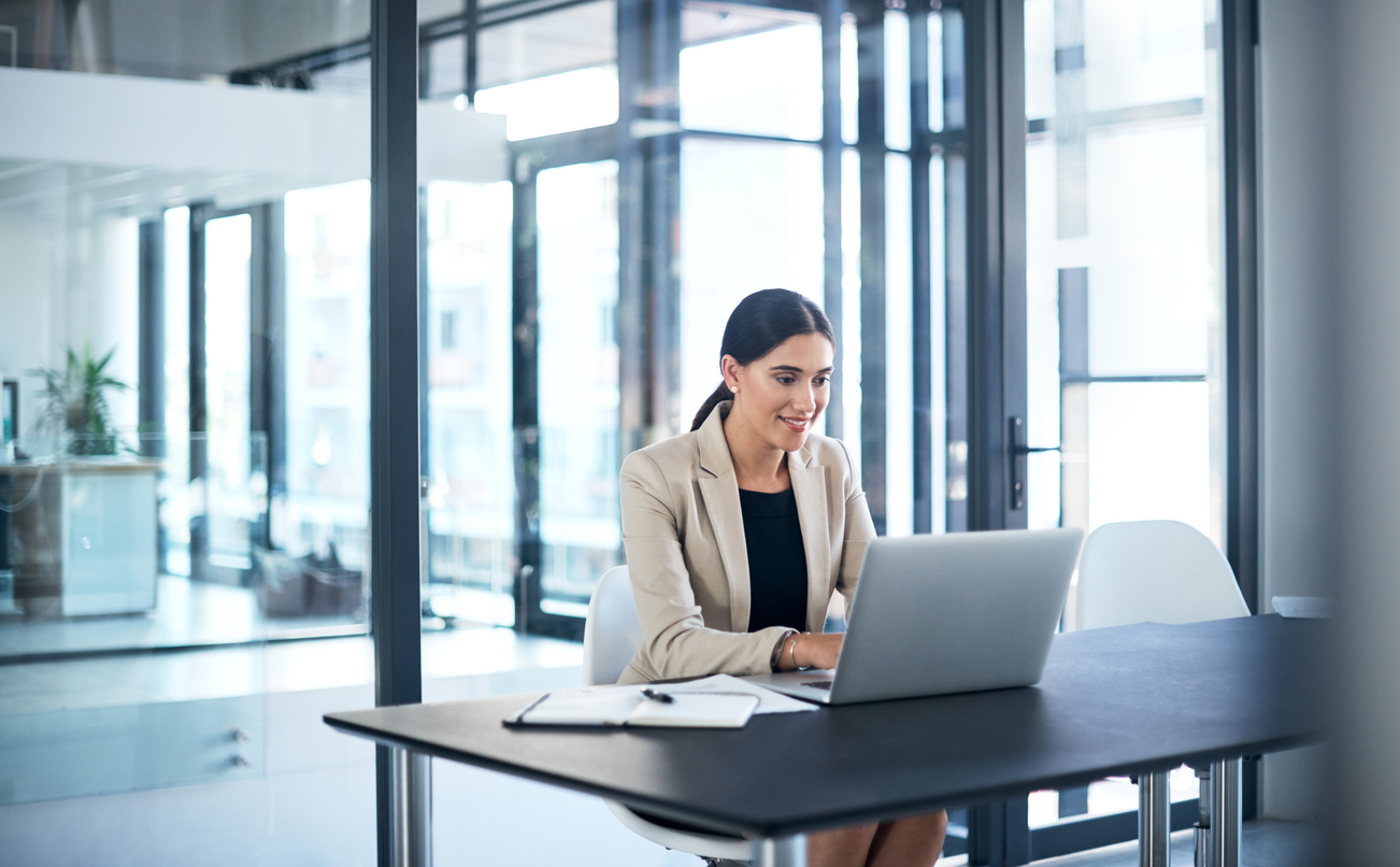 Image of woman working on a laptop